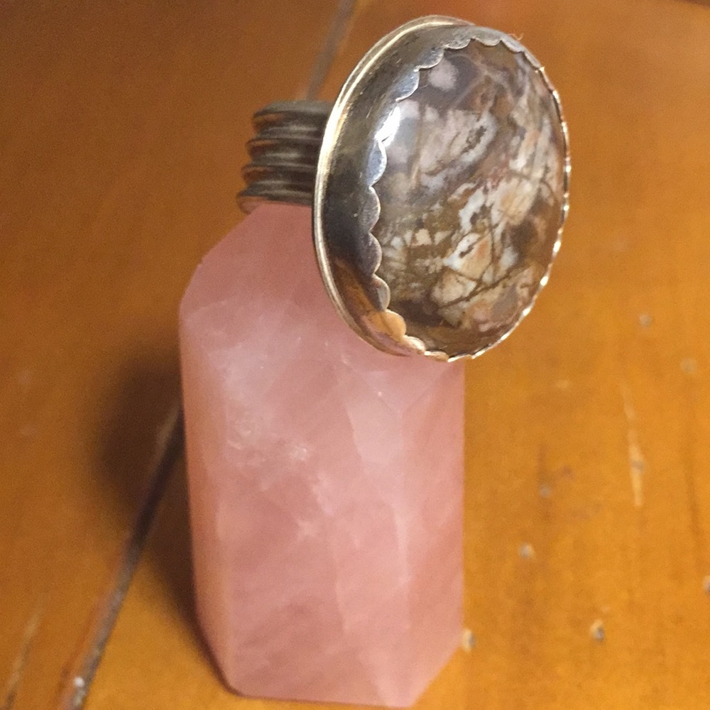 One of a kind silver and polished stone ring.